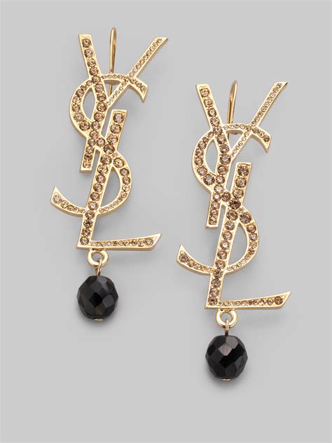 ysl saint laurent paris logo tribute gold stud pierced earrings|ysl st laurent earrings.